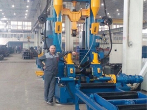 Комбинированная рабочая станция с двутавровой балкой для сборки, сварки и правки